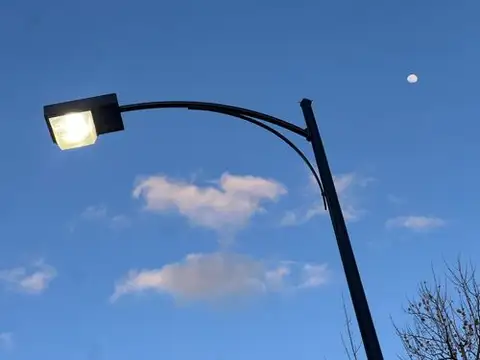 Streetlight, moon, and a perfect twilight sky.
